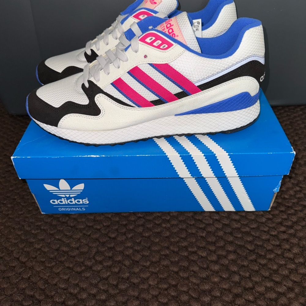 Adidas White and Black Athletic Shoes Retro-Inspired Design